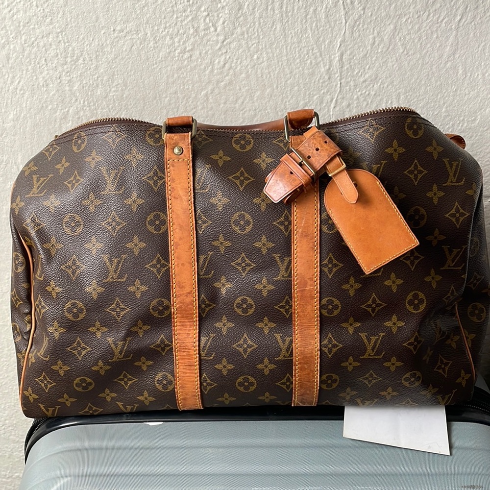 Vintage travel tote original authentic LV leather